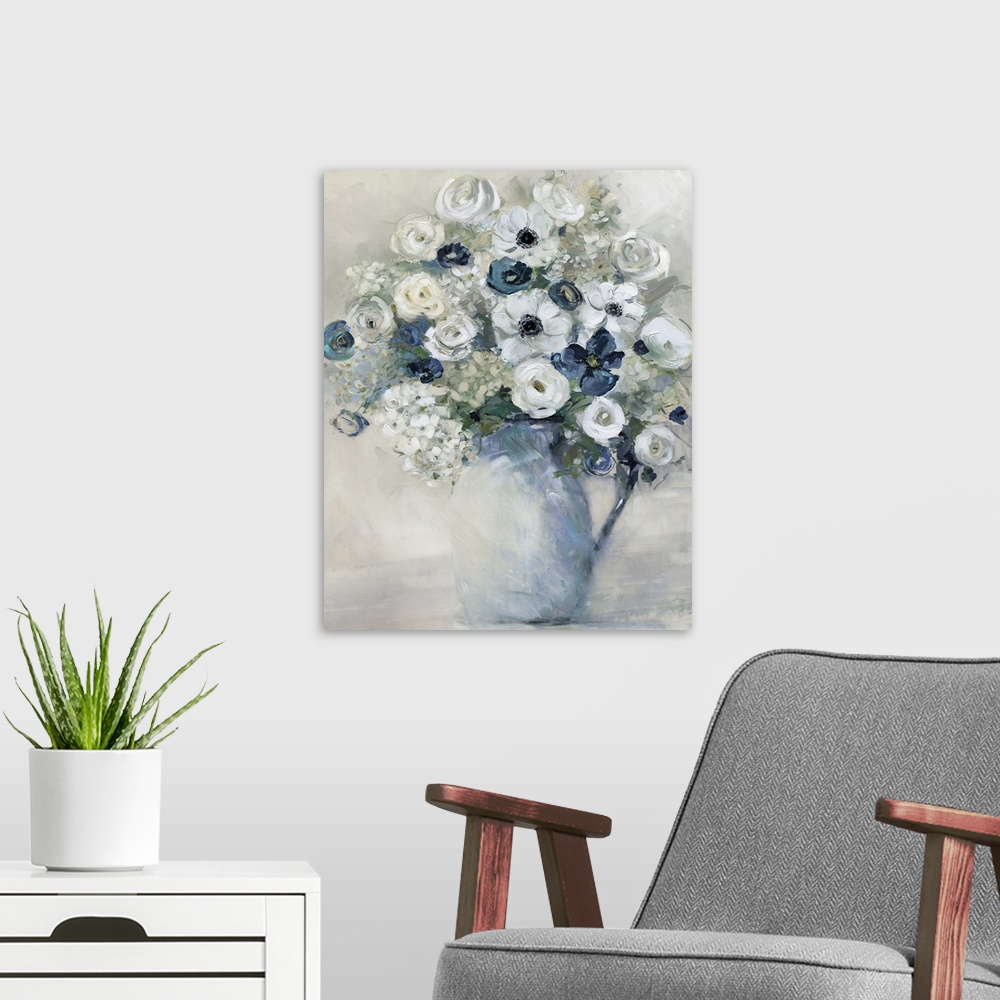 A modern room featuring Vertical artwork of a vase full of flowers in tones of blue, grey and white.