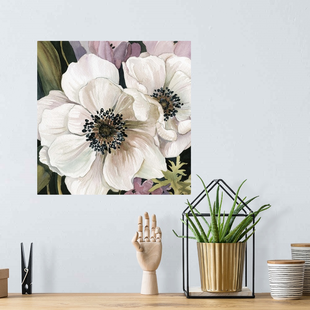 A bohemian room featuring A watercolor painting of white and pink anemone flowers.