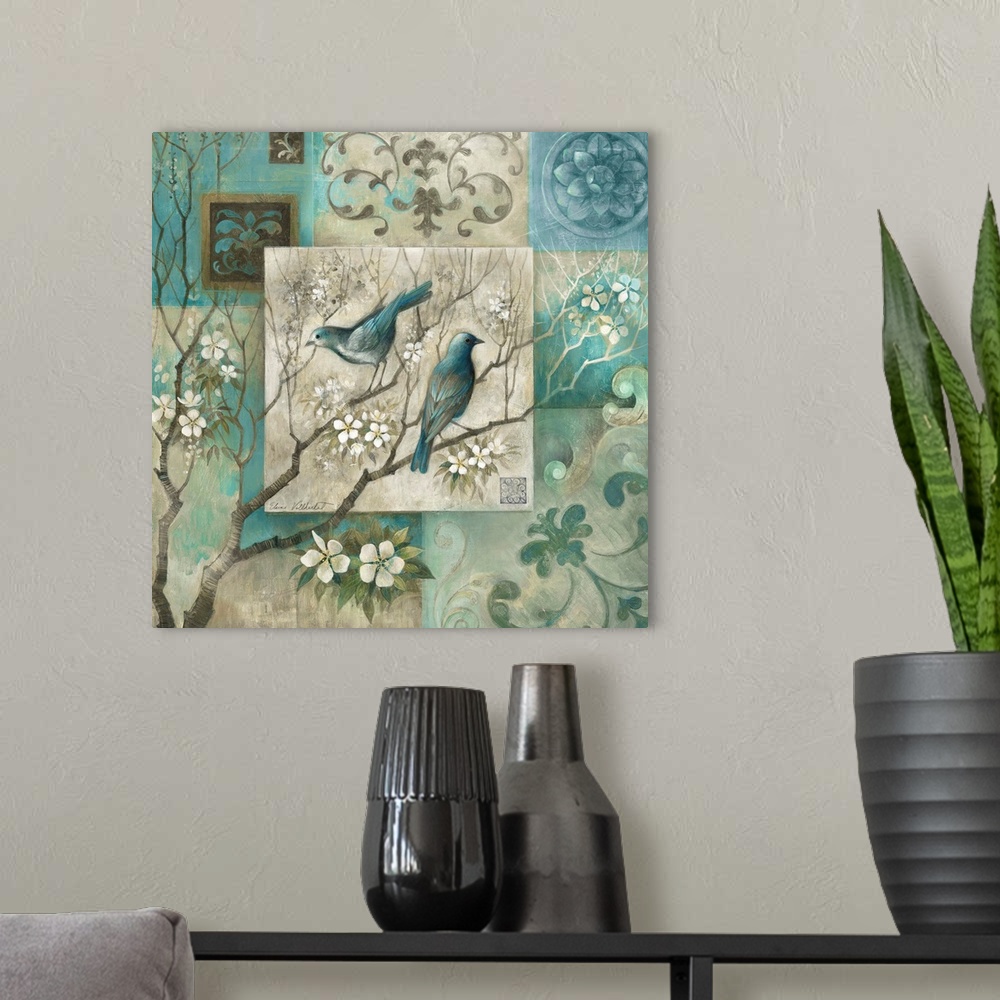A modern room featuring Decorative art of two birds perched on a white cherry blossom tree surrounded by a tile border em...