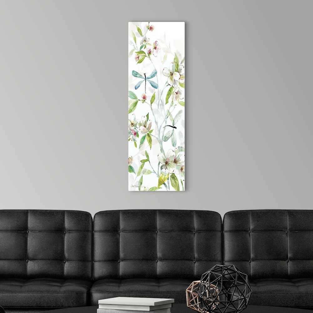 A modern room featuring A watercolor painting of two dragonflies flying among branches covered in flowers and leaves.