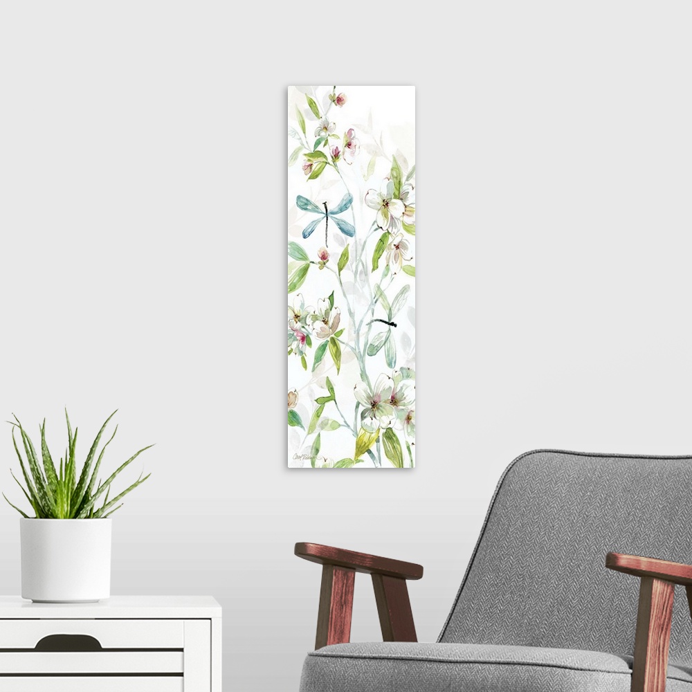 A modern room featuring A watercolor painting of two dragonflies flying among branches covered in flowers and leaves.