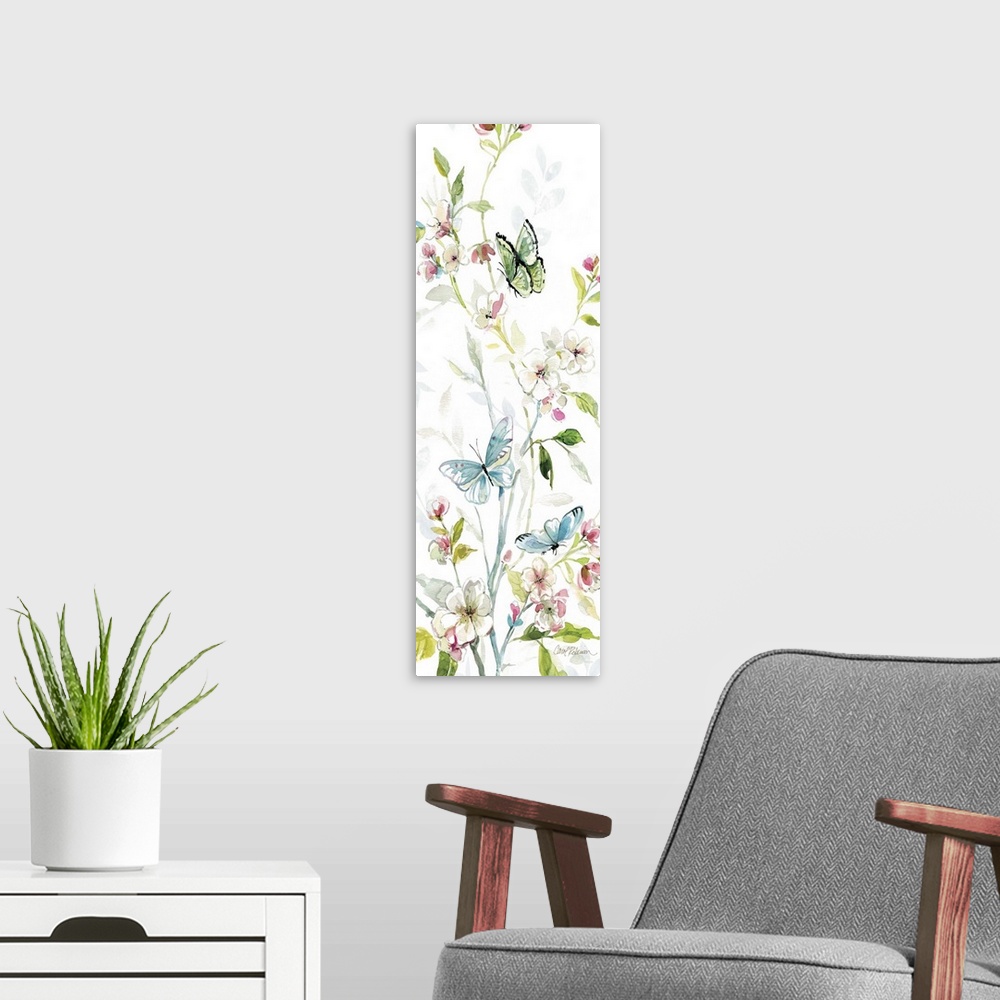A modern room featuring A watercolor painting of three butterflies flying among branches covered in flowers and leaves.