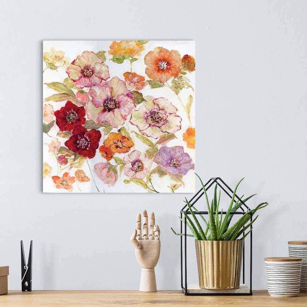 A bohemian room featuring Contemporary square painting of warm toned flowers on a solid white background.