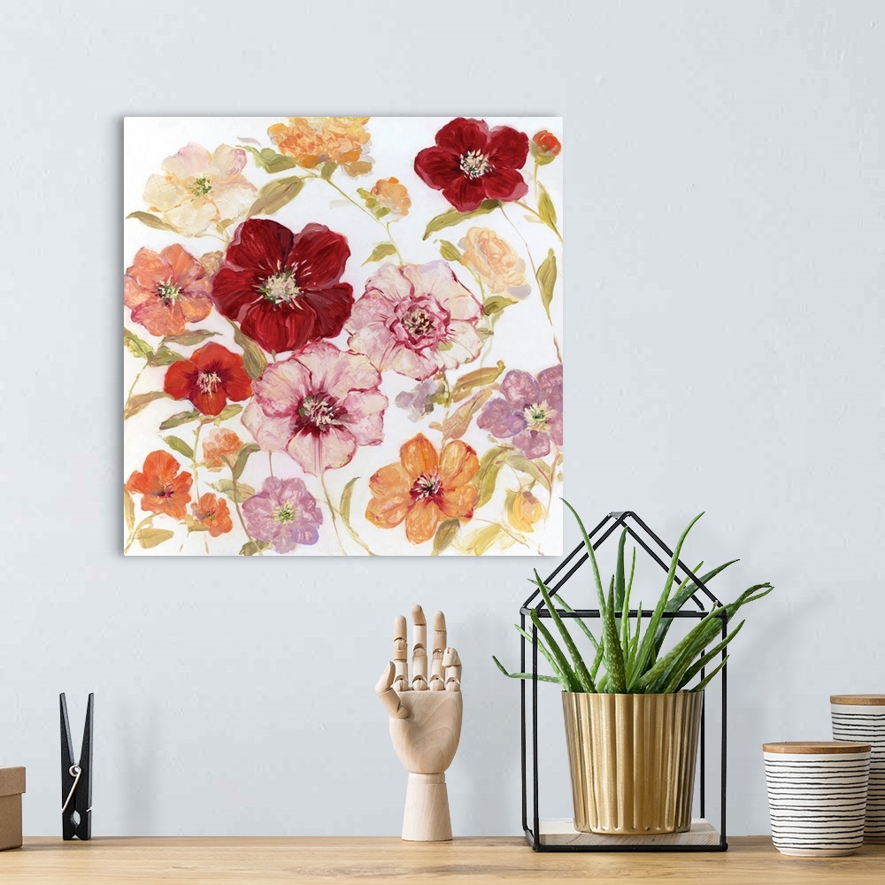 A bohemian room featuring Contemporary square painting of warm toned flowers on a solid white background.