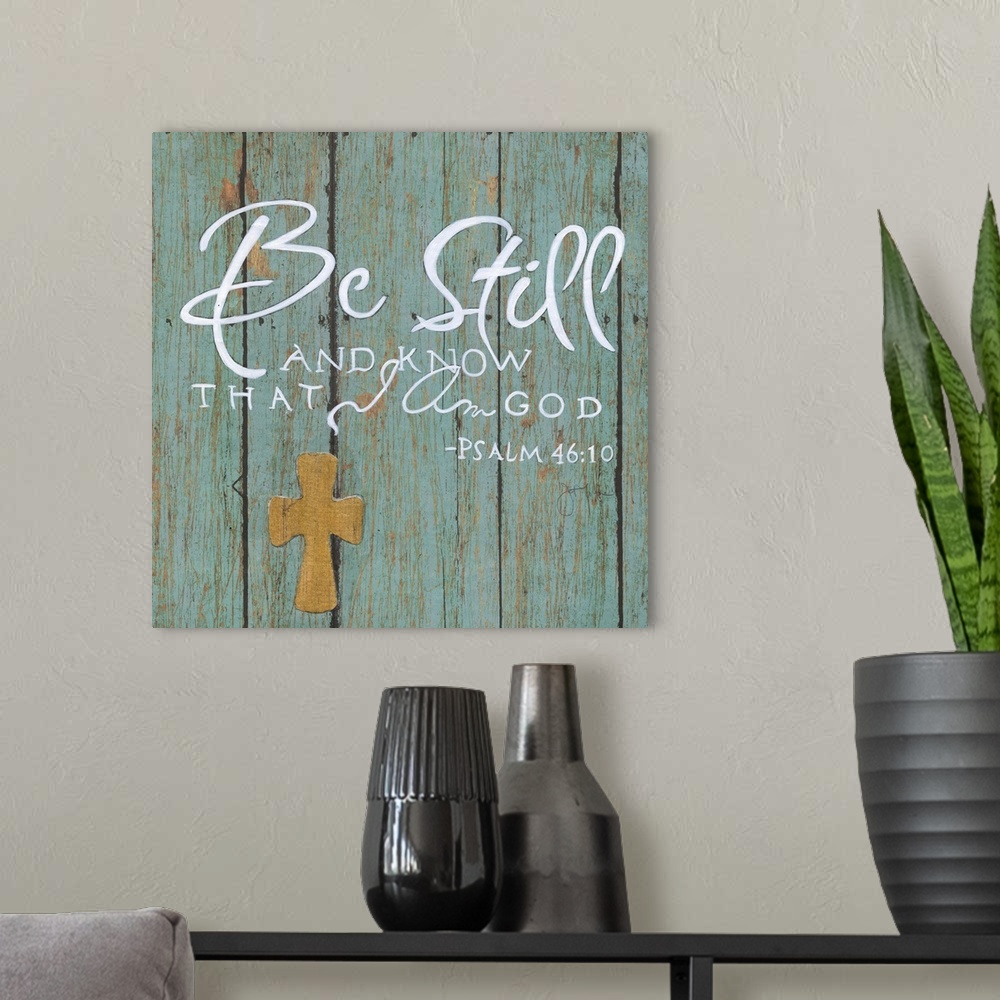 A modern room featuring A decorative religious painting on a blue, aged wooden background that has the quote from Psalm 4...