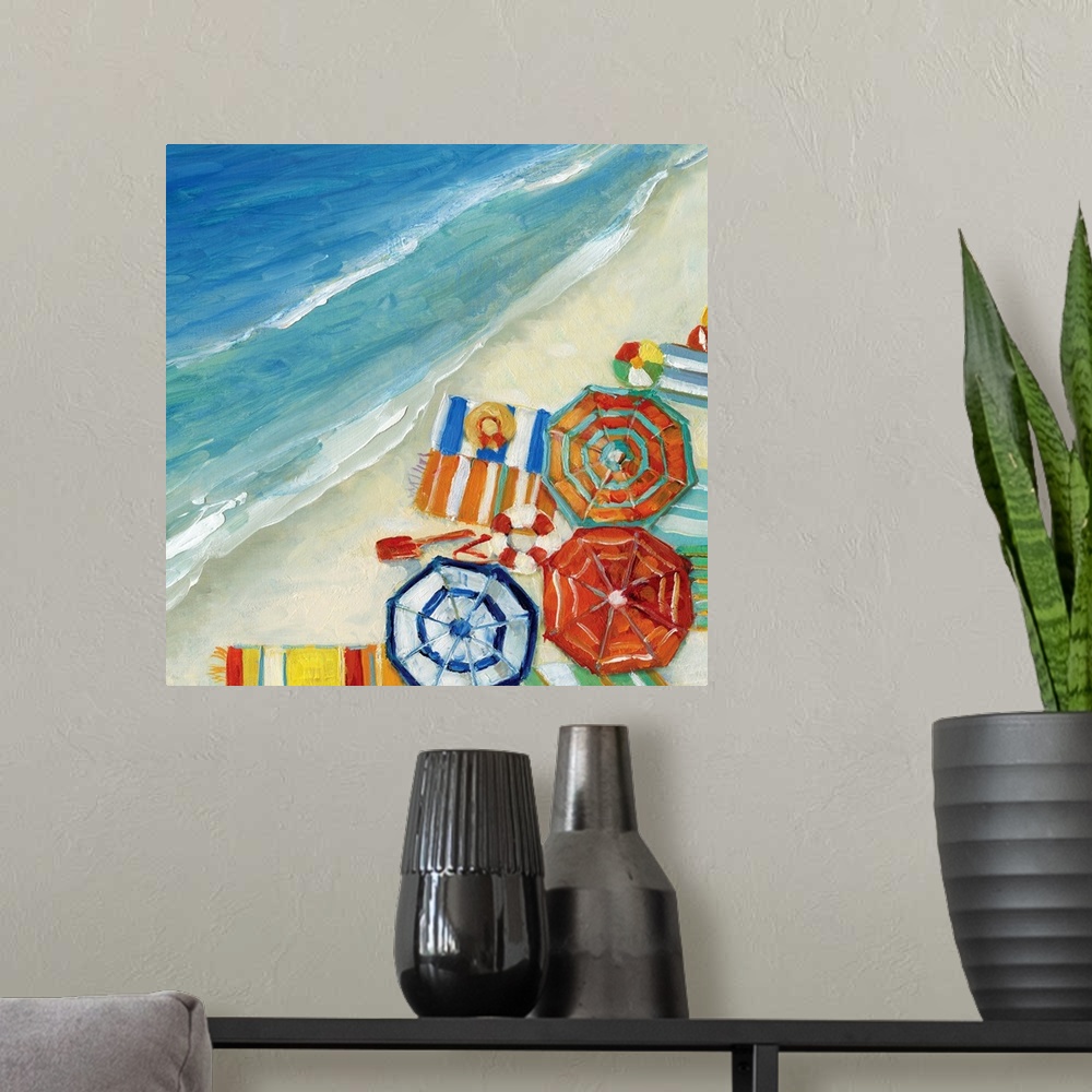 A modern room featuring Contemporary painting of an aerial view of umbrellas, beach blankets, and other beach accessories.