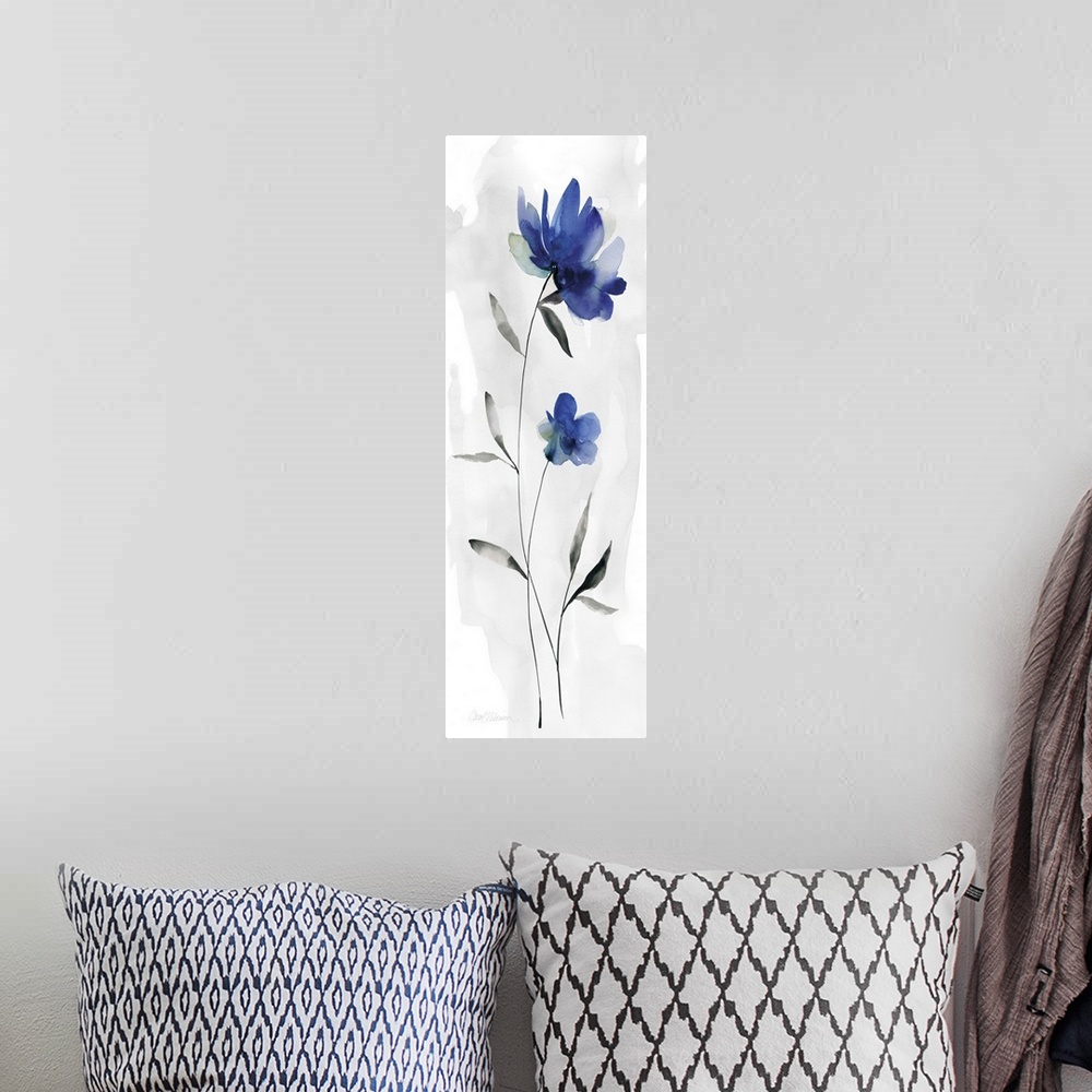 A bohemian room featuring Watercolor art print of a deep blue flower on a pale grey background.