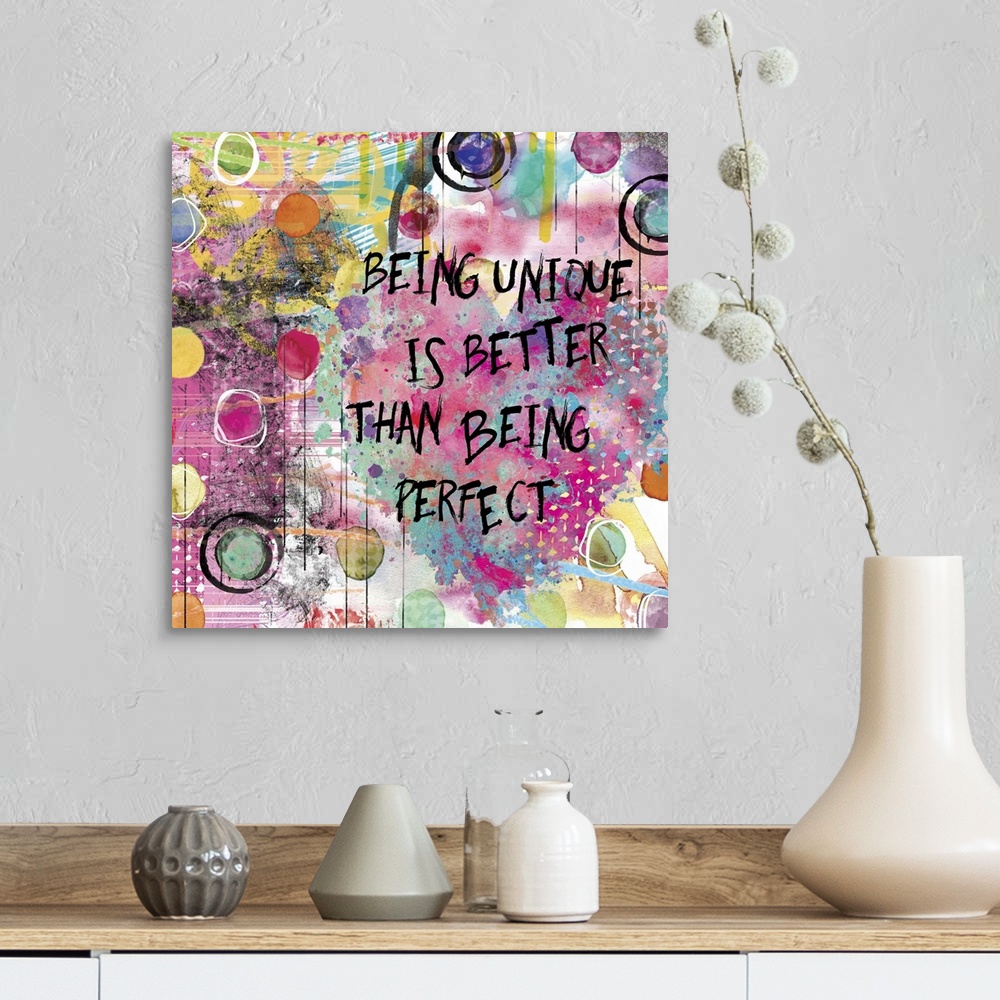 A farmhouse room featuring Inspirational square painting with colorful designs, circles, and a large heart with the phrase "...