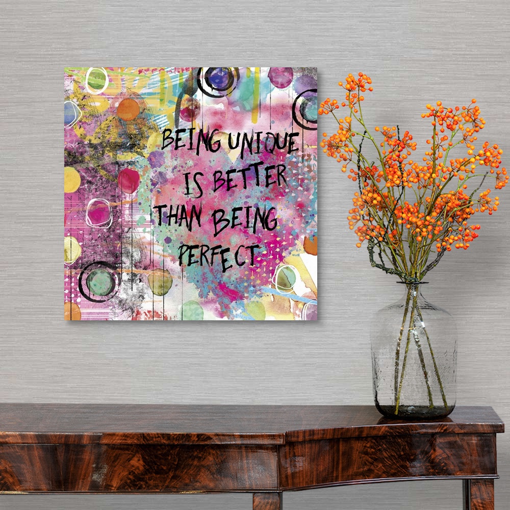 A traditional room featuring Inspirational square painting with colorful designs, circles, and a large heart with the phrase "...