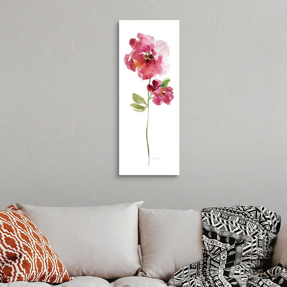 A bohemian room featuring Watercolor painting of a bright red flower on a white background.