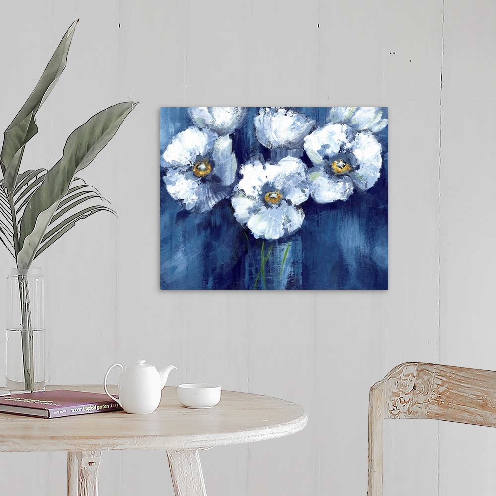 A farmhouse room featuring Large painting of white poppy flowers on a dark blue background.