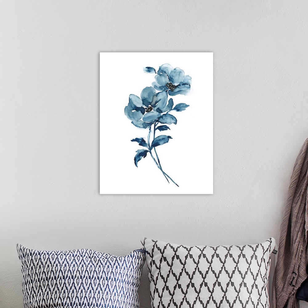A bohemian room featuring A contemporary watercolor painting of flowers in shades of blue.