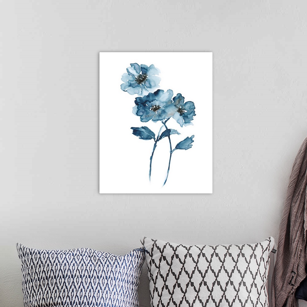A bohemian room featuring A contemporary watercolor painting of flowers in shades of blue.