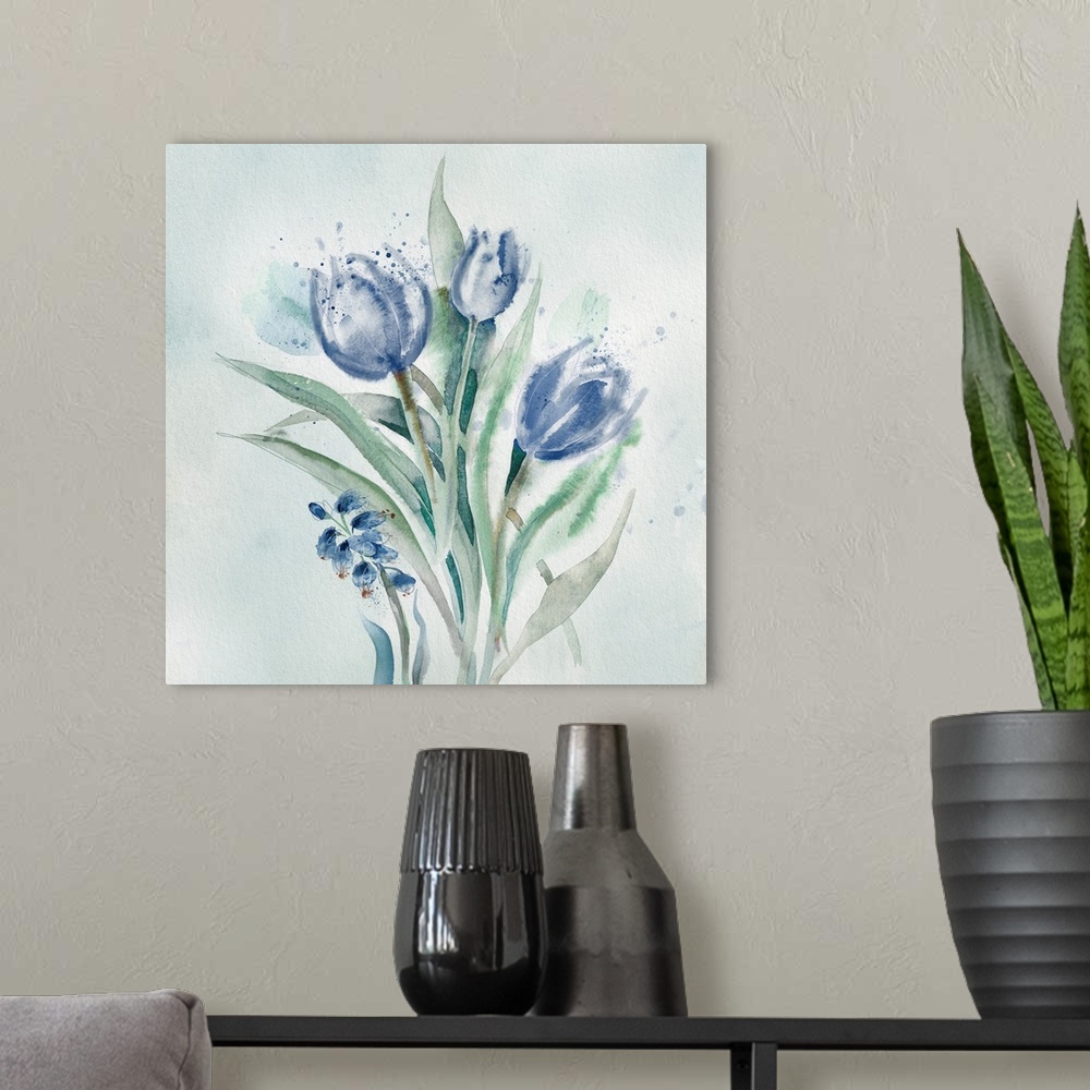 A modern room featuring A watercolor painting of blue flowers with speckled accents.