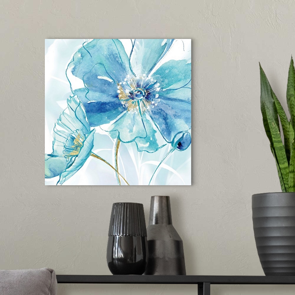 A modern room featuring Square decor with two poppy flowers made in shades of blue with metallic gold.