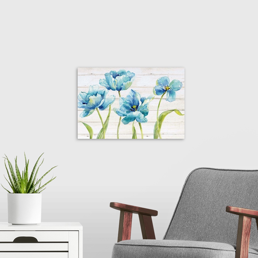 A modern room featuring Watercolor painting of four blue tulips on a distressed white shiplap background.