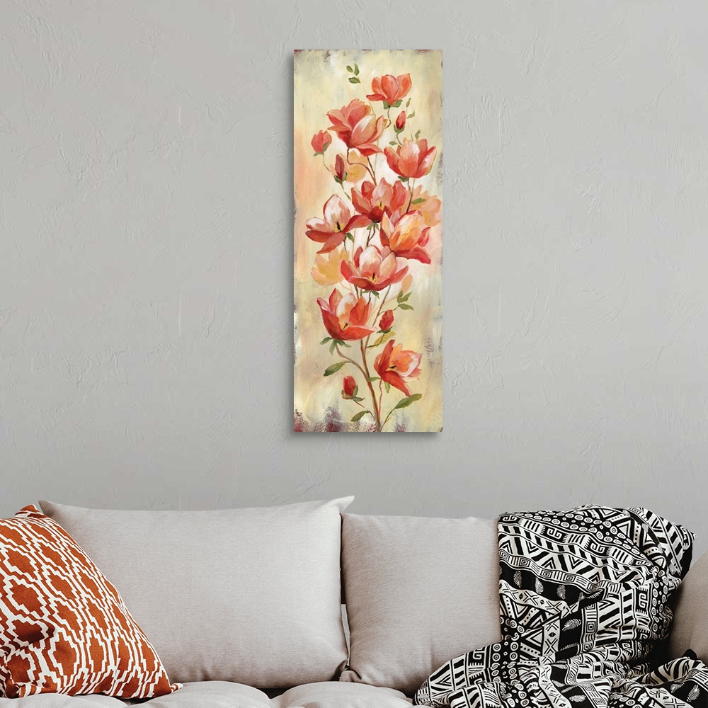 A bohemian room featuring Tall panel painting of warm toned flowers growing upwards on a branch.