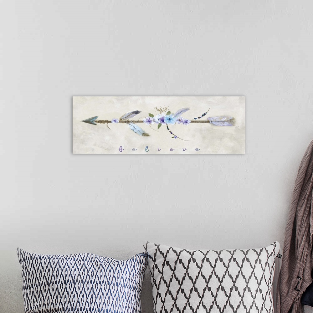 A bohemian room featuring Contemporary painting of an arrow decorated with flowers, beads, and feathers with the word "Beli...