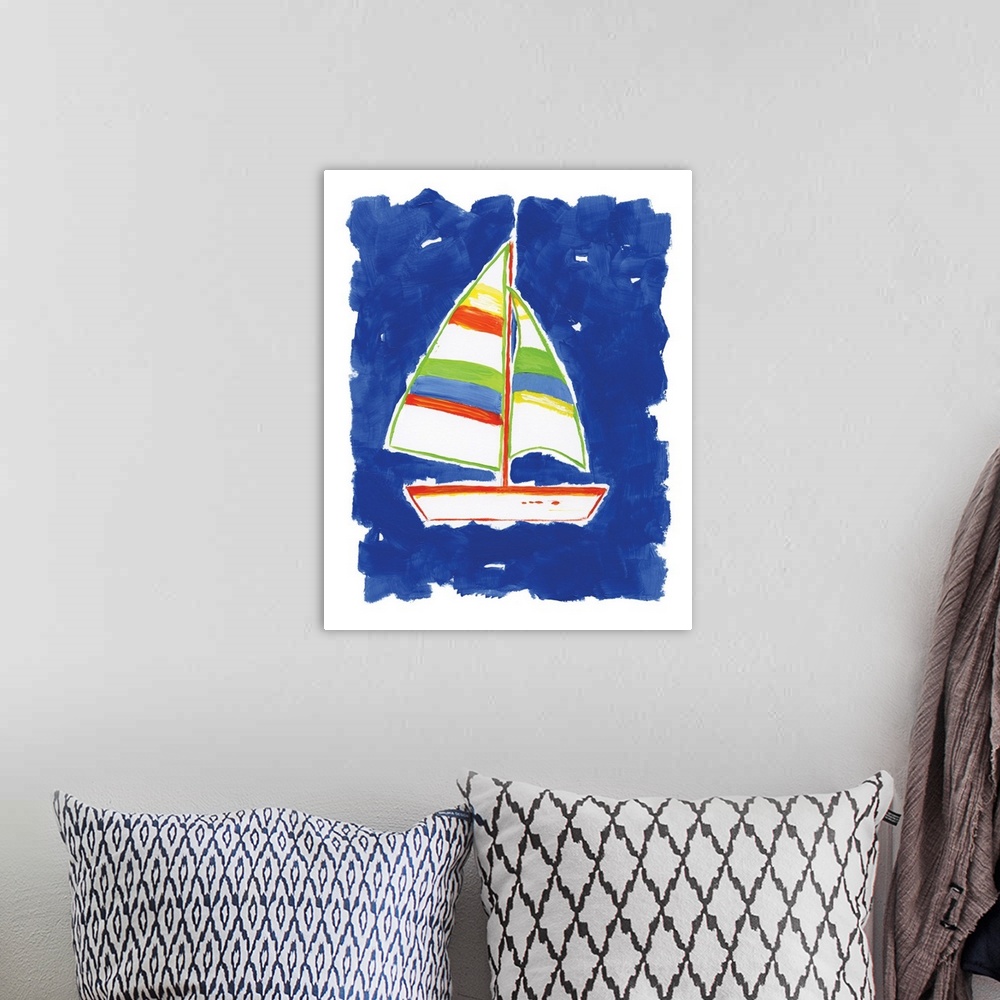 A bohemian room featuring A decorative painting of a sailboat that has red, green, and yellow hues with a bright blue backg...