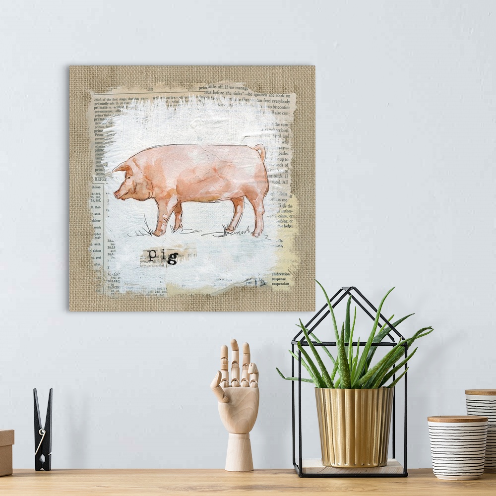 A bohemian room featuring Square burlap collage art of a pig painted on top of newspaper clippings with the word "pig" stam...