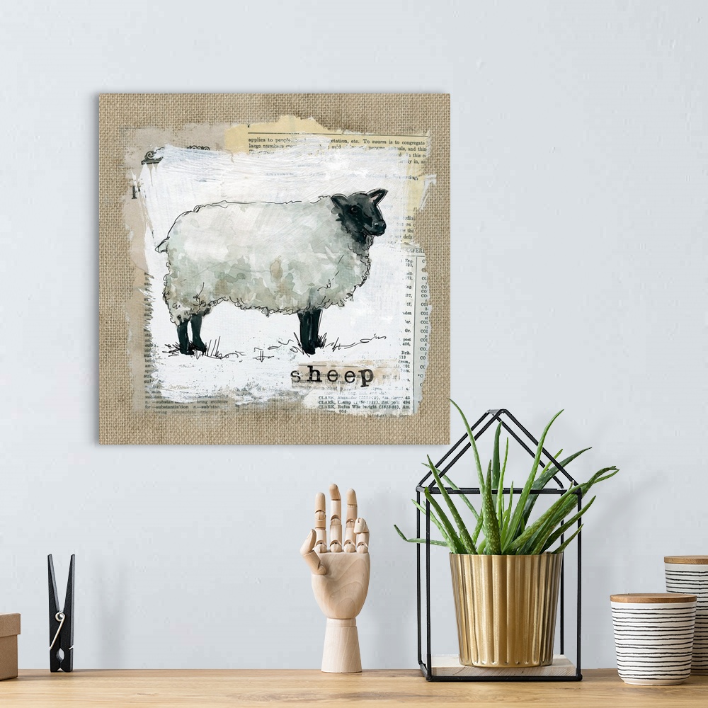 A bohemian room featuring Square burlap collage art of a sheep painted on top of newspaper clippings with the word "sheep" ...