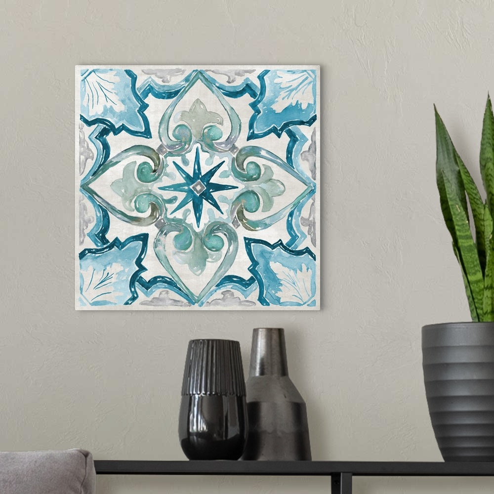 A modern room featuring Square painting of a symmetrical tile print in blue and green.