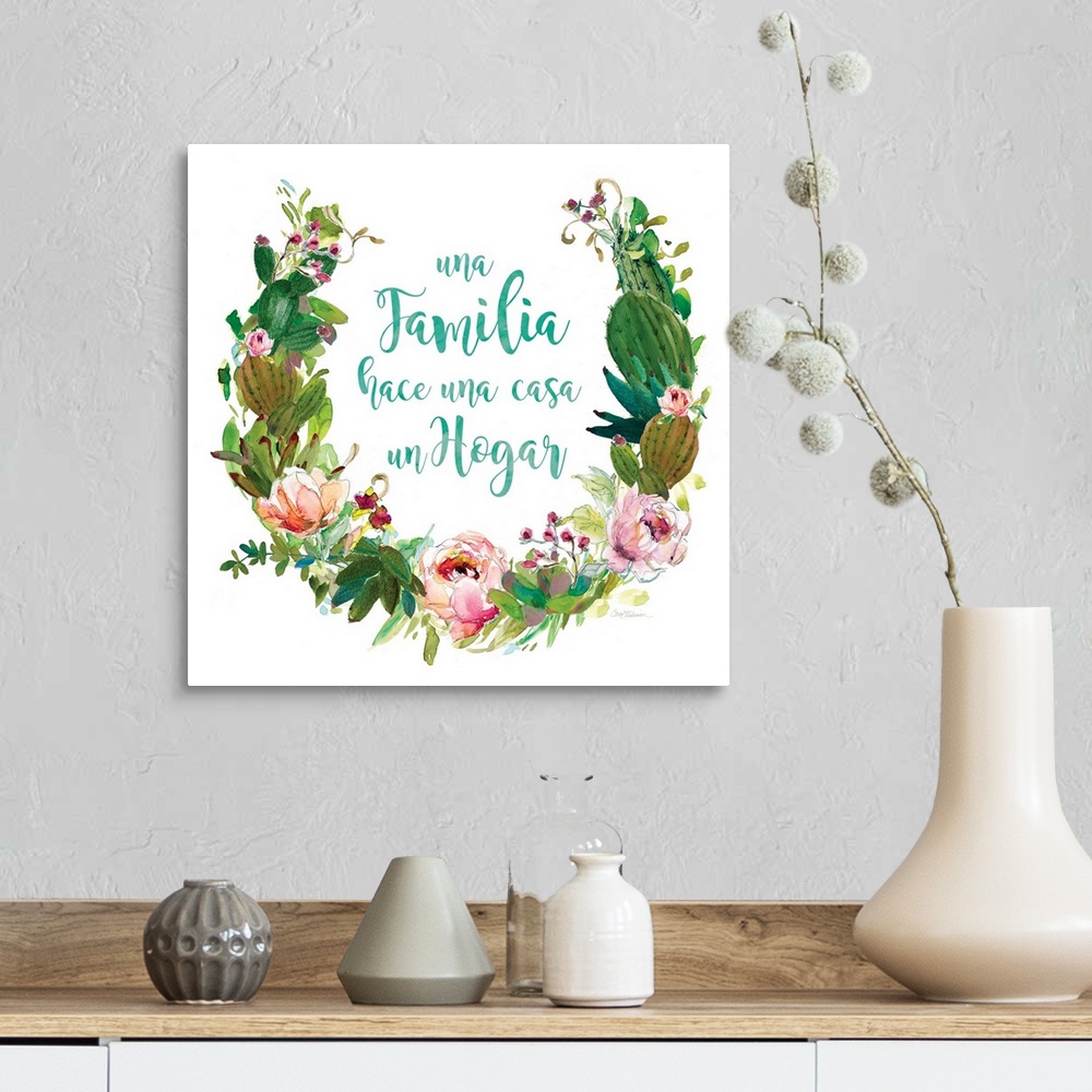 A farmhouse room featuring A wreath of cacti, various flowers and foliage surround the words, "Una Familia hace una casa un ...