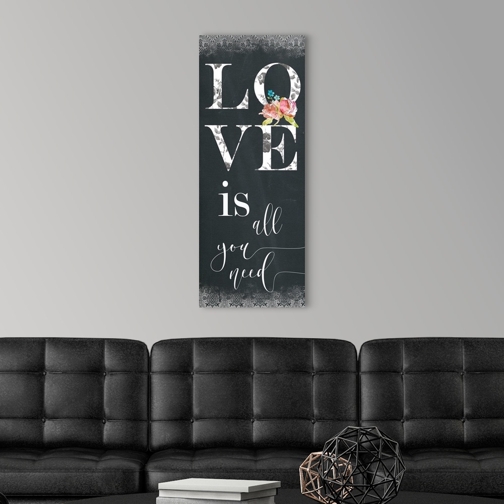 A modern room featuring Panel typography with a chalkboard feel that reads "Love is all you need" with a decorative patte...