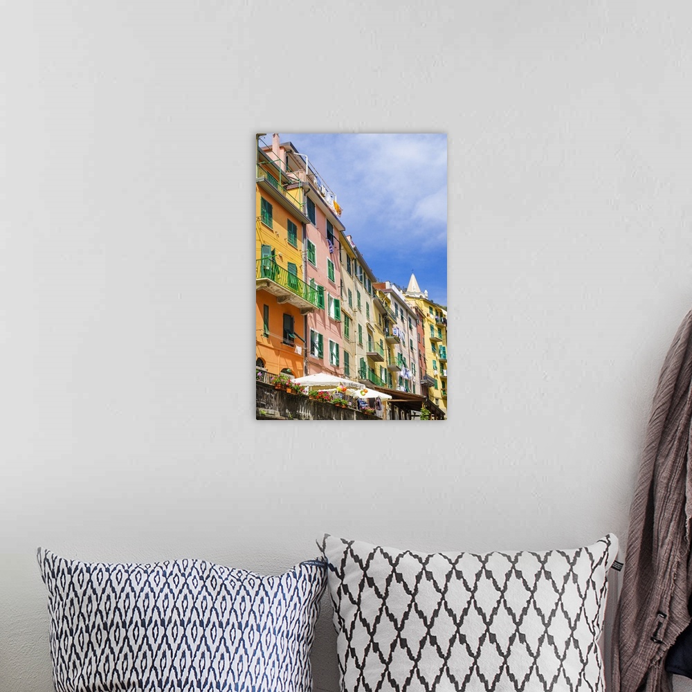 A bohemian room featuring Narrow street and colorful houses in Riomaggiore, Cinque Terre, Liguria, Italy