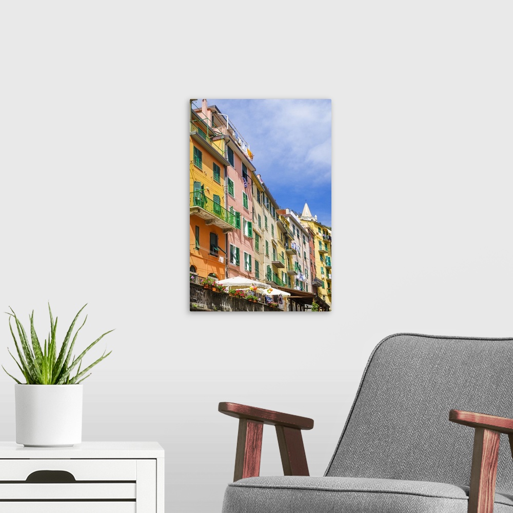 A modern room featuring Narrow street and colorful houses in Riomaggiore, Cinque Terre, Liguria, Italy