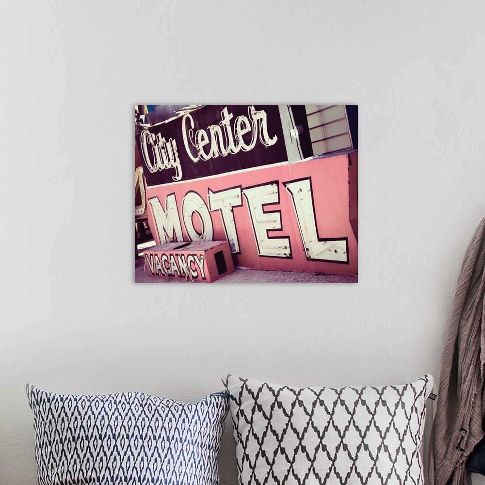A bohemian room featuring Photograph of a pink and maroon vintage City Center Motel sign from a unique angle.
