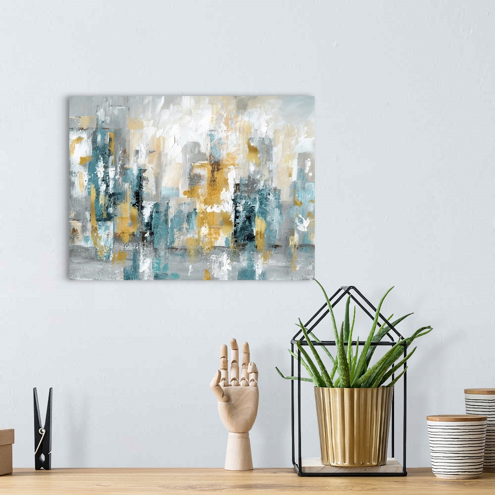 A bohemian room featuring Large abstract cityscape in shades of blue, grey, and gold.