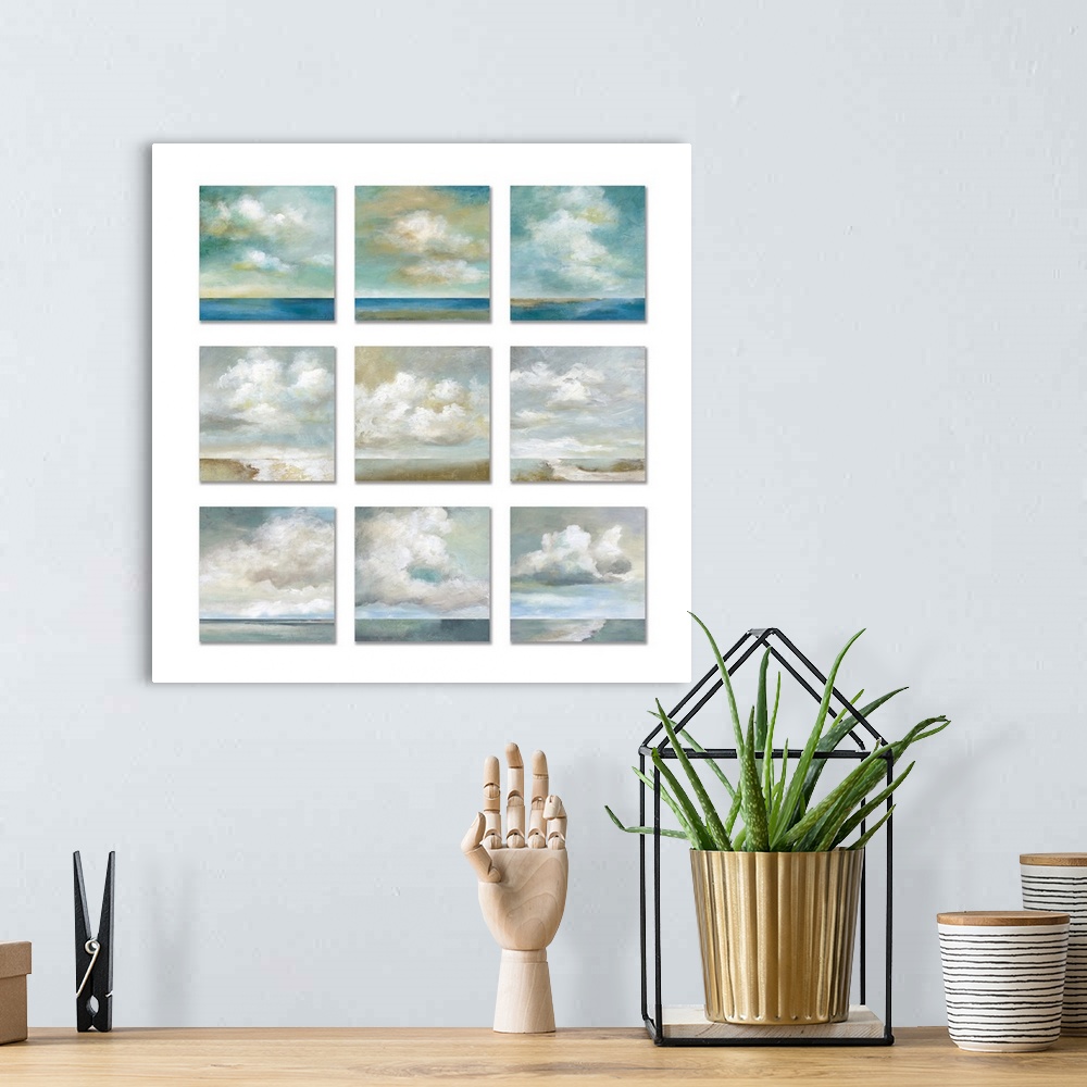 A bohemian room featuring Three by three square paintings of white fluffy clouds over a body of water against a white backg...