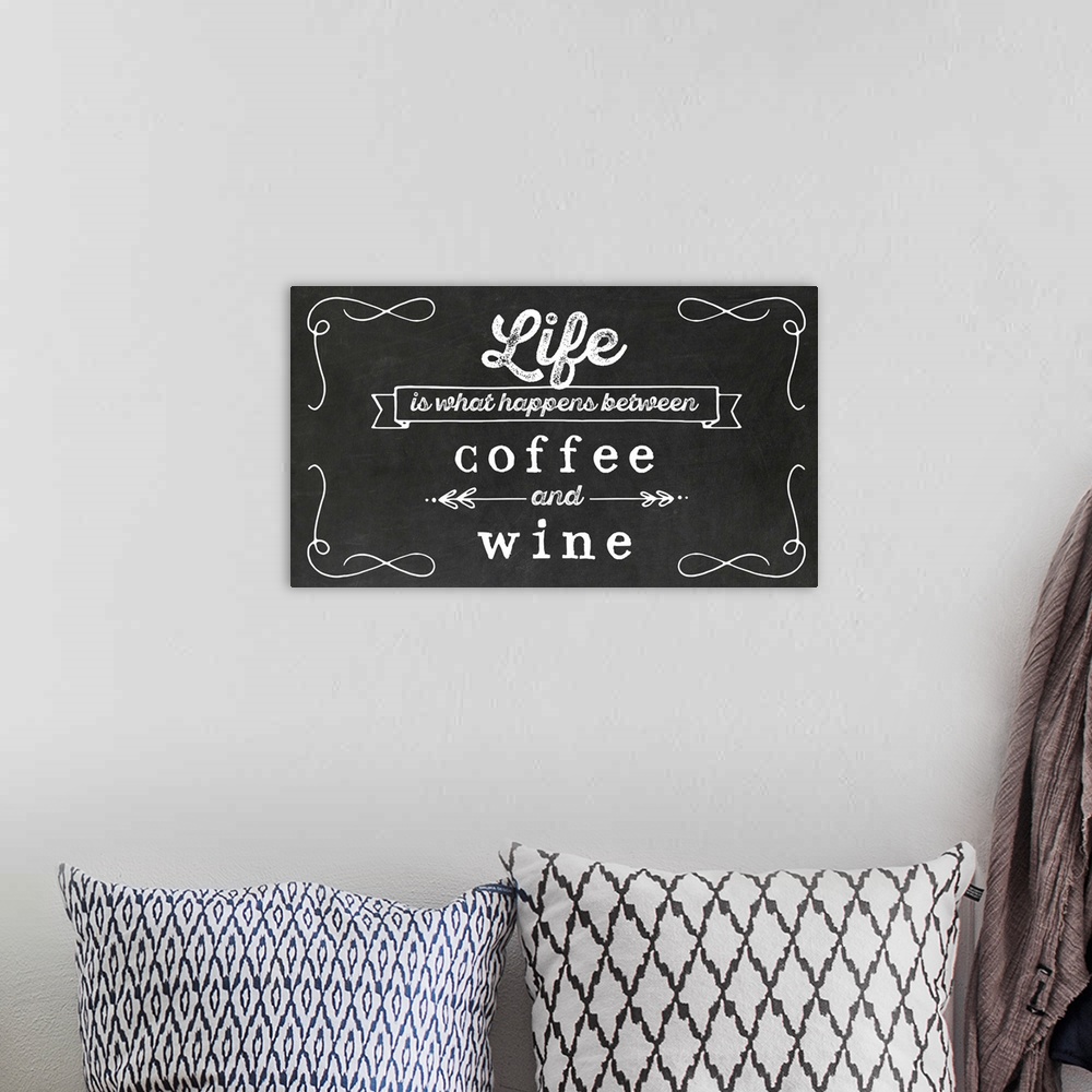A bohemian room featuring 'Life Is What Happens Between Coffee and Wine' in black and white.