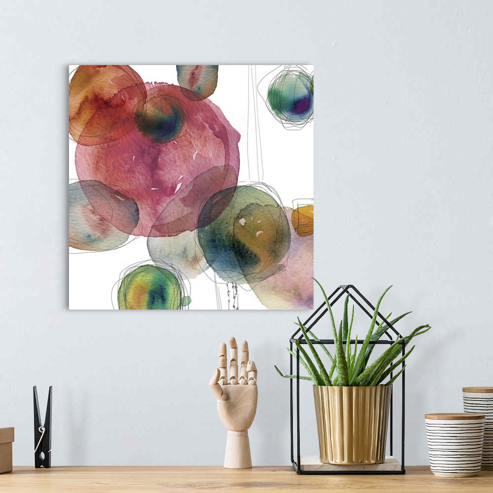 A bohemian room featuring Square abstract art with colorful watercolor circles and thin black outlining lines on a white ba...