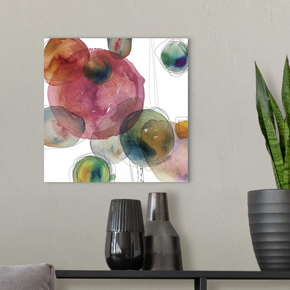 A modern room featuring Square abstract art with colorful watercolor circles and thin black outlining lines on a white ba...