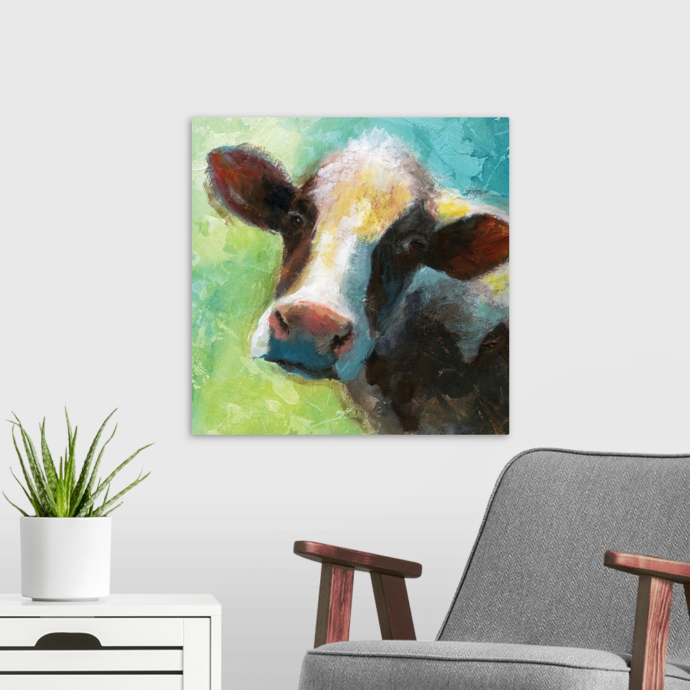 A modern room featuring A colorful painting of a cow.