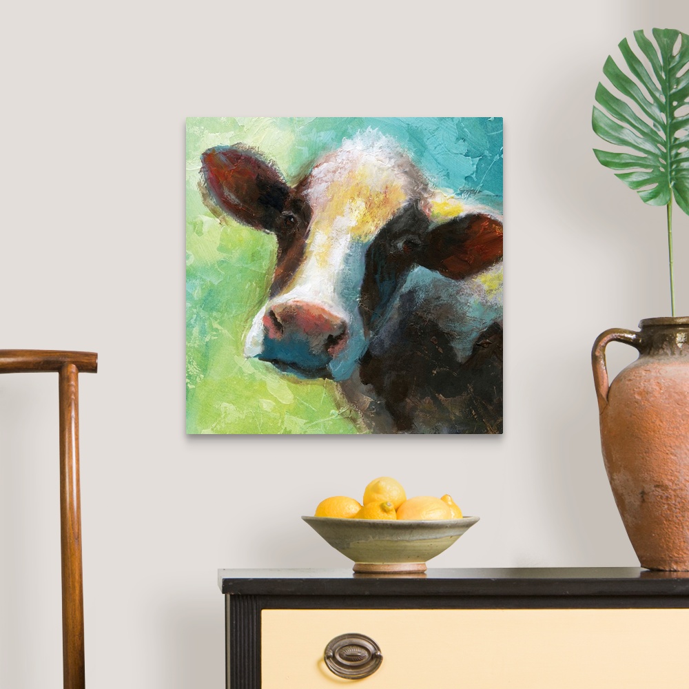 A traditional room featuring A colorful painting of a cow.