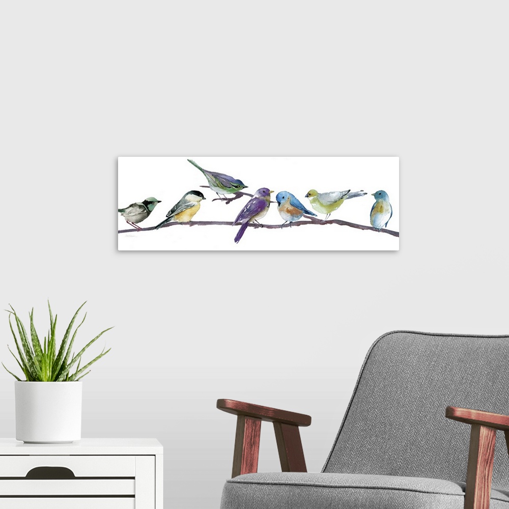 A modern room featuring Brightly colored songbirds perched in a row on a branch.