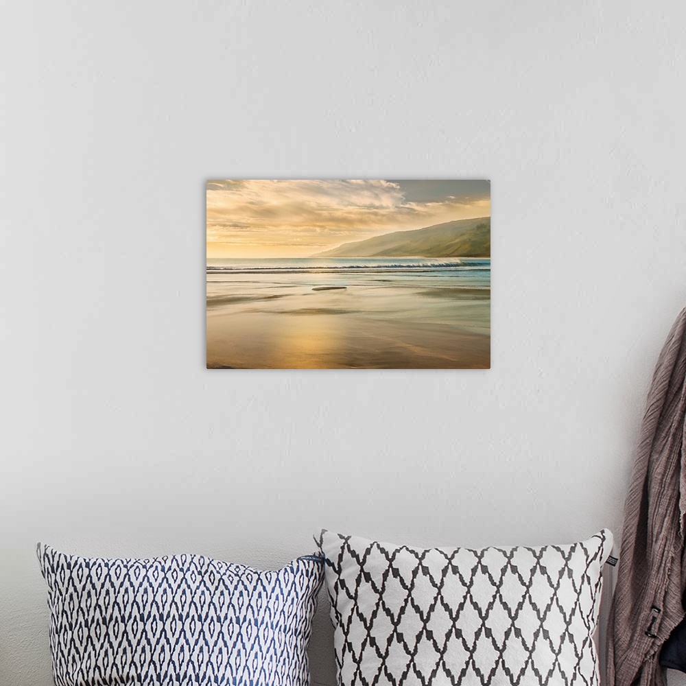 A bohemian room featuring Photograph of a shore with beautiful lighting and mountains in the background.