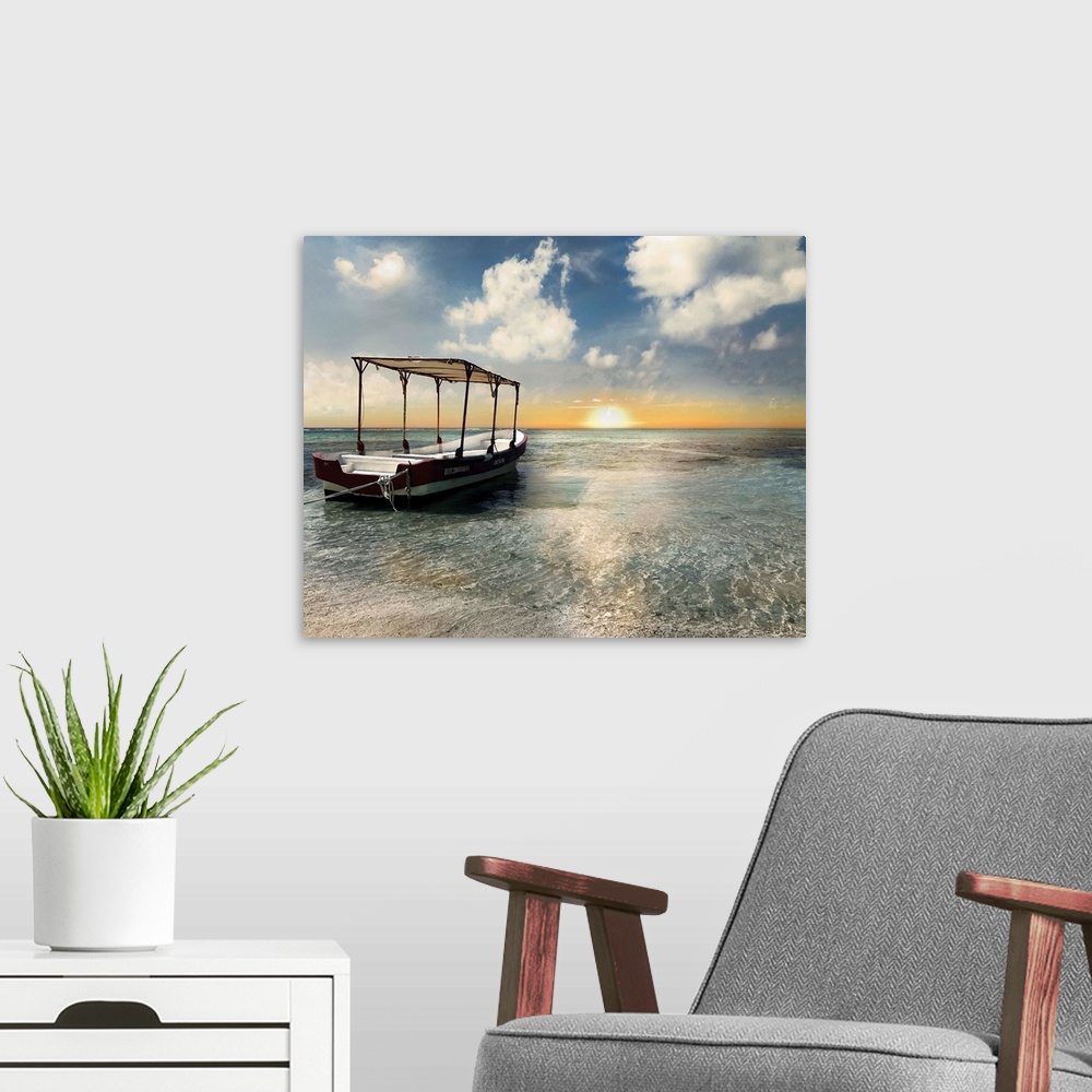 A modern room featuring In this photo, an anchored boat rests on a bank of the ocean in Costa Maya during a Carribean sun...