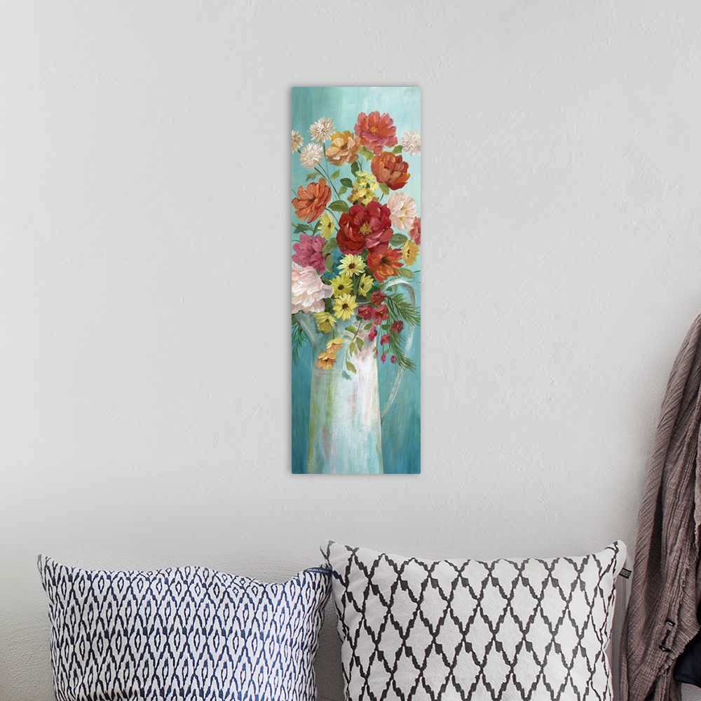 A bohemian room featuring Large panel painting of colorful flowers arranged in a white pitcher on a blue background.