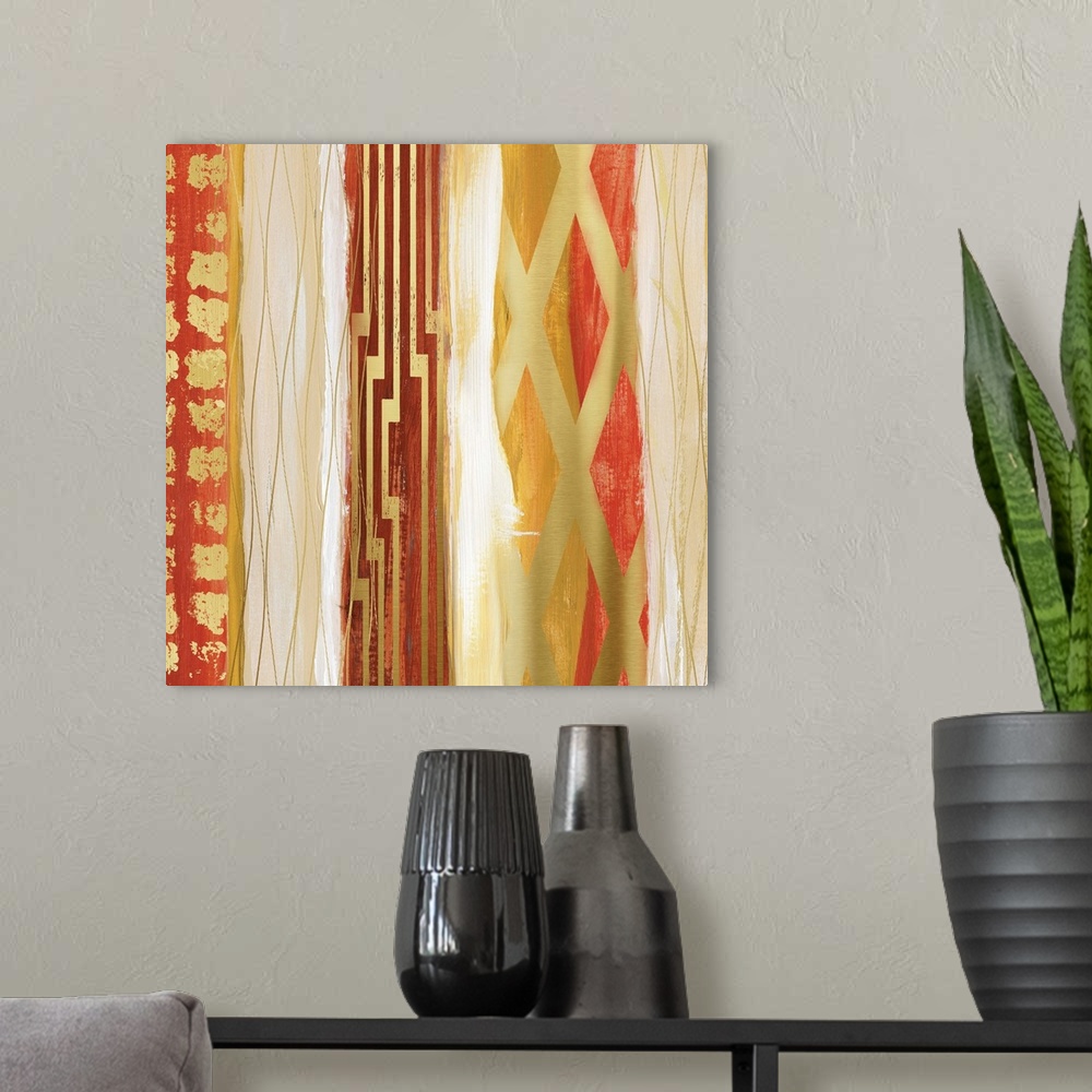 A modern room featuring Abstract painting in bold shades of gold and red in vertical bands with geometric patterns.
