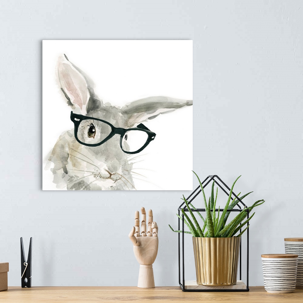 A bohemian room featuring Watercolor painting of a gray rabbit wearing big black rimmed glasses on a white square background.