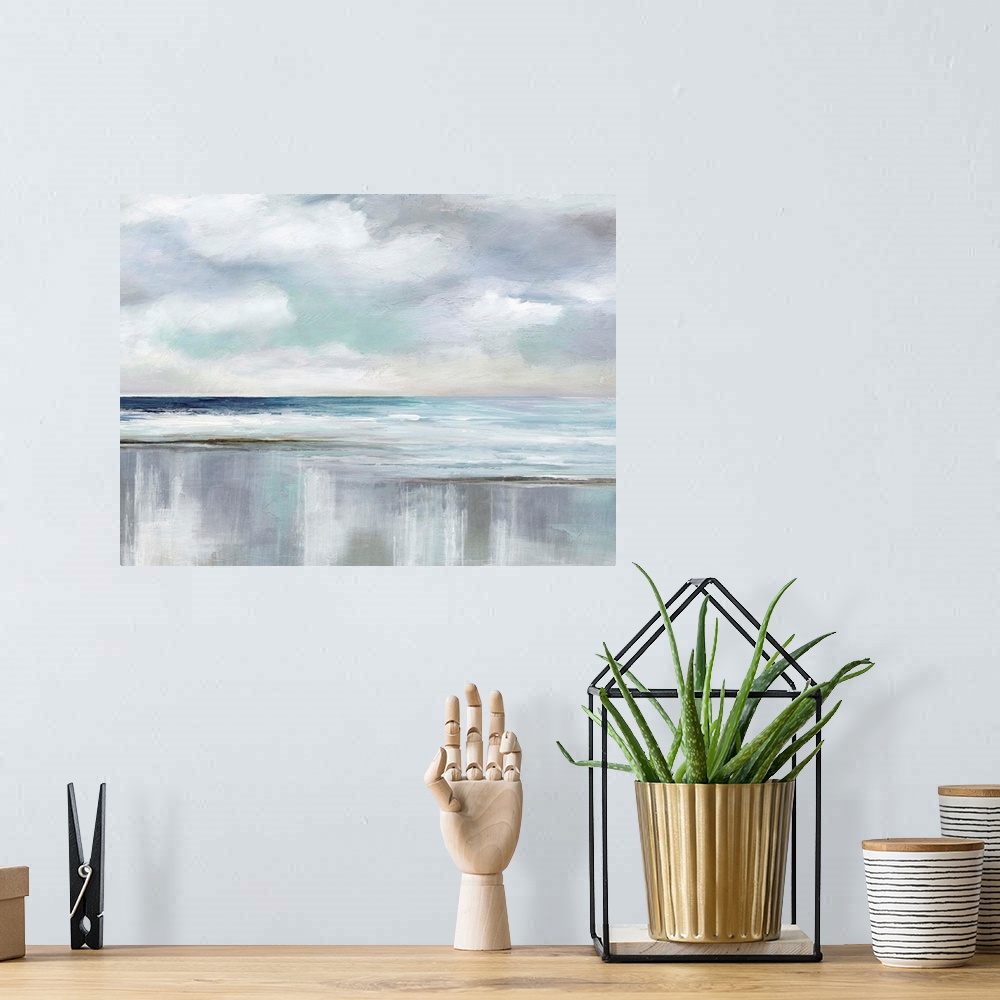 A bohemian room featuring Abstract landscape painting of an ocean with fluffy clouds in the sky using various blues, grays ...