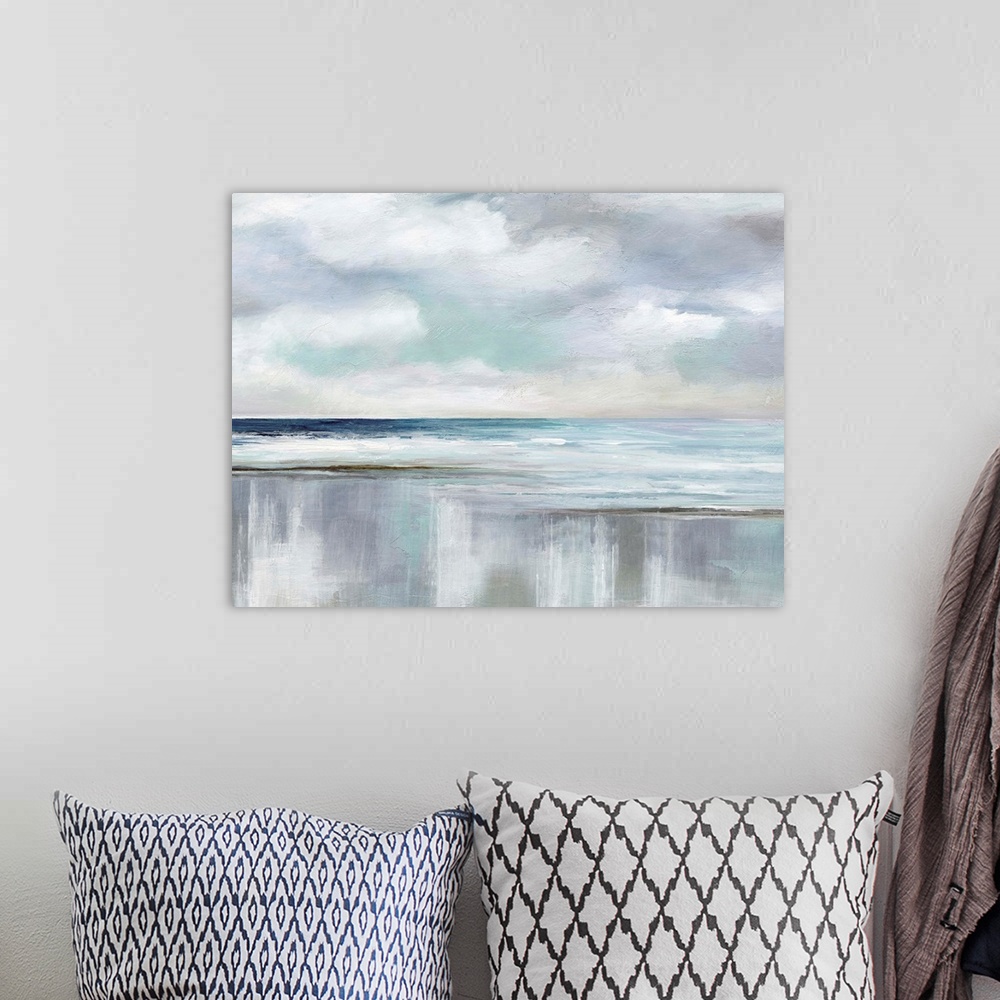 A bohemian room featuring Abstract landscape painting of an ocean with fluffy clouds in the sky using various blues, grays ...
