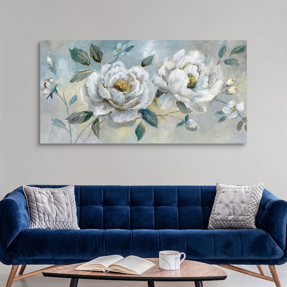 A modern room featuring Large horizontal painting of white flowers with gold outlines on a blue, yellow, and gray backgro...