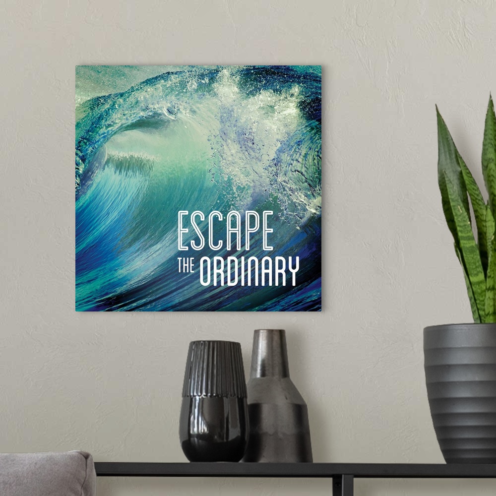A modern room featuring Square photograph of a giant wave with the phrase "Escape the Ordinary" written on the bottom cor...