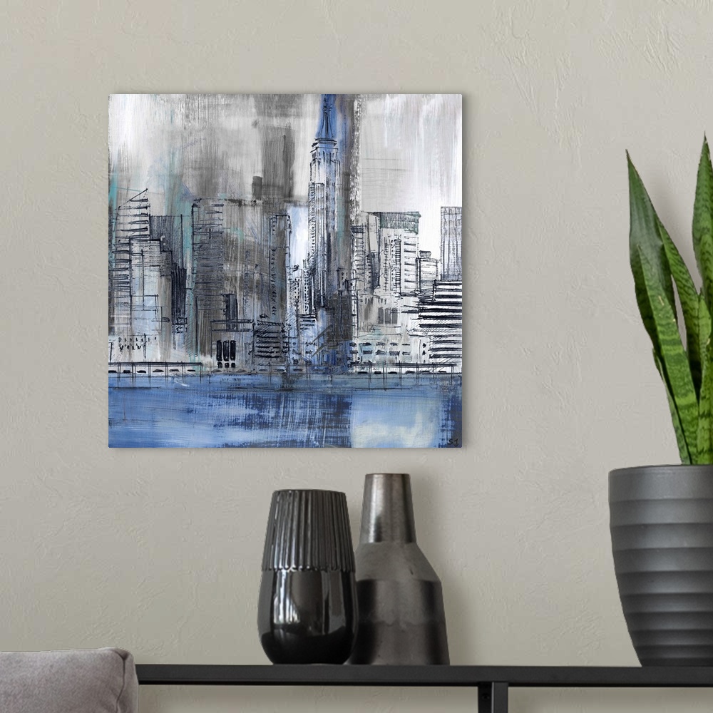 A modern room featuring Square abstract painting of part of the New York City skyline, highlighting the Empire State Buil...