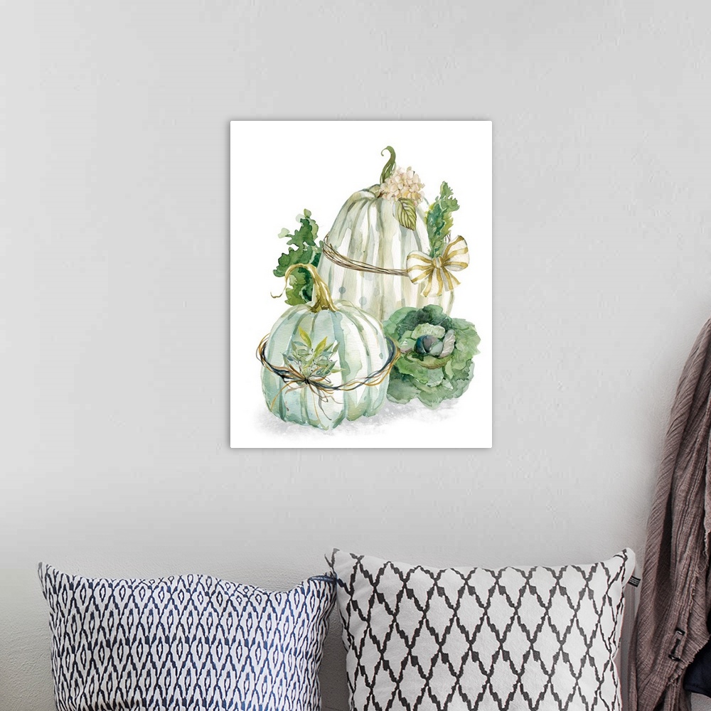 A bohemian room featuring Vertical watercolor painting of two harvest pumpkins wrapped with a bow and greenery on a white b...